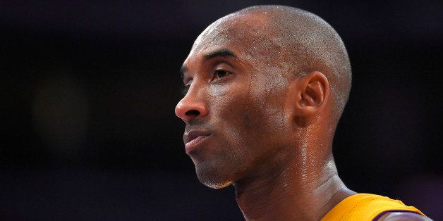Los Angeles Lakers guard Kobe Bryant looks on during the second half of an NBA basketball game against the Cleveland Cavaliers, Thursday, Jan. 15, 2015, in Los Angeles. The Cavaliers won 109-102. (AP Photo/Mark J. Terrill)