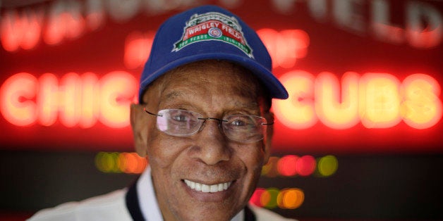 In this March 24, 2014, photo Chicago Cubs' Hall of Famer Ernie Banks smiles after an interview at the Cubs offices in Chicago. (AP Photo/M. Spencer Green)