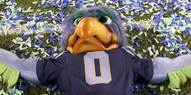 EAST RUTHERFORD, NJ - FEBRUARY 02: Blitz, the Seattle Seahawks mascot, does snow angels on the field after the Seahawks 43-8