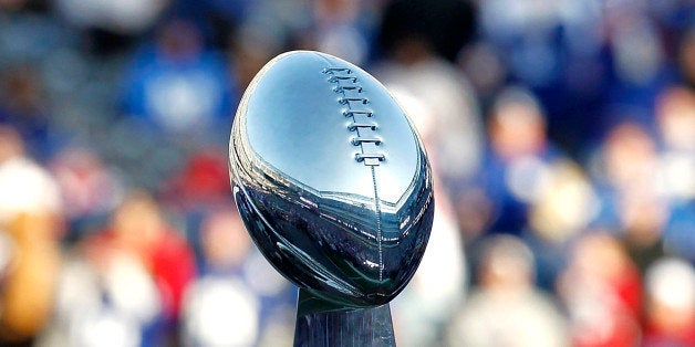 EAST RUTHERFORD, NJ - FEBRUARY 07: The George Halas Trophy for the NFC Championship and the Vince Lombardi Trophy are displa