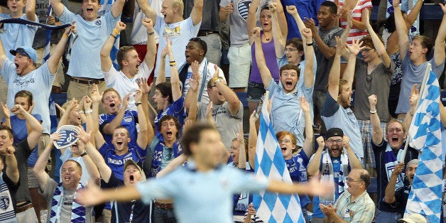 KANSAS CITY, KS - AUGUST 17: Sporting Kansas City fans cheer after Graham Zusi #8 of Sporting Kansas City scored a goal during the 1st half of the Major League Soccer game against the Portland Timbers at LiveStrong Sporting Park on August 17, 2011 in Kansas City, Kansas. (Photo by Jamie Squire/Getty Images)