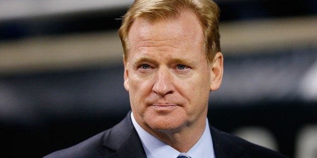 DETROIT, MI - NOVEMBER 24: Commissioner of the National Football League Roger Goodell watches the pregame warms up prior to