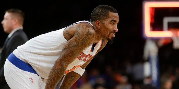 New York Knicks' J.R. Smith reacts after an NBA basketball game against the Portland Trail Blazers, Sunday, Dec. 7, 2014, in New York. The Trail Blazers won 103-99. (AP Photo/Frank Franklin II)