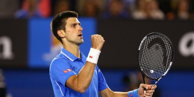 MELBOURNE, AUSTRALIA - FEBRUARY 01: Novak Djokovic of Serbia celebrates a point in his men's final match against Andy Murray