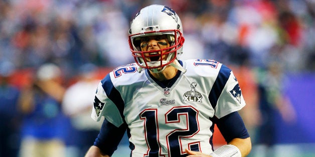 GLENDALE, AZ - FEBRUARY 01: Tom Brady #12 of the New England Patriots shouts prior to playing in Super Bowl XLIX at Universi