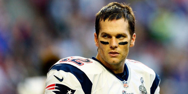 GLENDALE, AZ - FEBRUARY 01: Tom Brady #12 of the New England Patriots looks on prior to Super Bowl XLIX against the Seattle