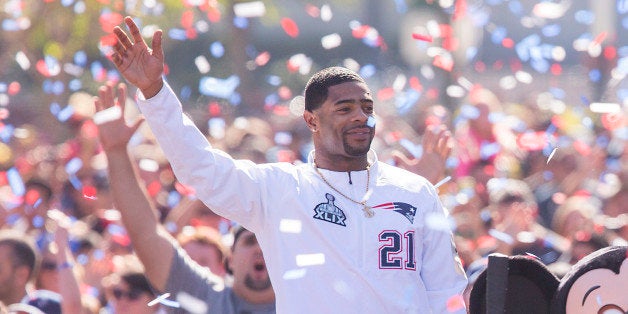 ANAHEIM, CA - FEBRUARY 02: In this handout image provided by Disneyland, New England Patriots players Julian Edelman (right) and Malcolm Butler were joined by Mickey Mouse as they celebrated their team's Super Bowl XLIX championship victory with a special cavalcade down Main Street, U.S.A. at Disneyalnd park in Anaheim, Calif., on Monday. In the frenzied moments following their team's feat of capturing the National Football League championship on Sunday, Edelman and Butler stood in front of a TV camera and shouted four words that have become an iconic reaction to milestone achievement: 'We're going to Disneyland!' (Photo by Paul Hiffmeyer/Disneyland via Getty Images)