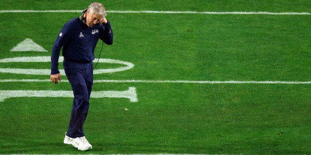 GLENDALE, AZ - FEBRUARY 01: Head coach Pete Carroll of the Seattle Seahawks looks dejected after defeat to the New England Patriots during Super Bowl XLIX at University of Phoenix Stadium on February 1, 2015 in Glendale, Arizona. The Patriots defeated the Seahawks 28-24. (Photo by Mike Ehrmann/Getty Images)