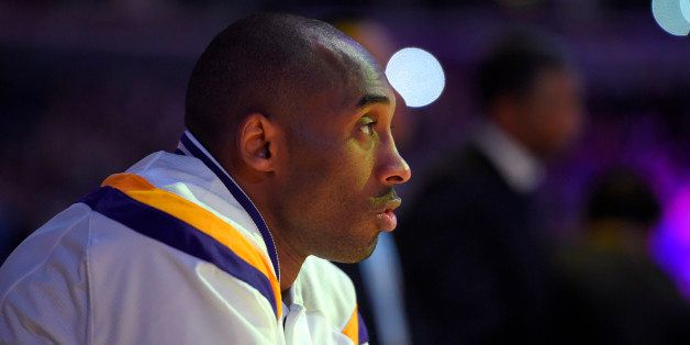 Los Angeles Lakers guard Kobe Bryant waits to be introduced prior to an NBA basketball game against the Indiana Pacers, Sunday, Jan. 4, 2015, in Los Angeles. (AP Photo/Mark J. Terrill)