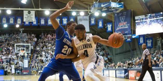 VILLANOVA, PA - FEBRUARY 16: Darrun Hilliard #4 of the Villanova Wildcats drives to the basket with Desi Rodriguez #20 of the Seton Hall Pirates defending on the play on February 16, 2015 at the Pavilion in Villanova, Pennsylvania. The Wildcats defeated the Pirates 80-54 (Photo by Mitchell Leff/Getty Images)