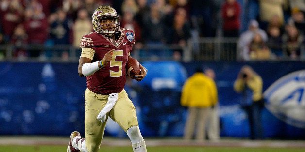 CHARLOTTE, NC - DECEMBER 06: Jameis Winston #5 of the Florida State Seminoles runs the ball against the Georgia Tech Yellow Jackets in the 2nd half during the Atlantic Coast Conference championship game on December 6, 2014 in Greenville, North Carolina. (Photo by Grant Halverson/Getty Images)