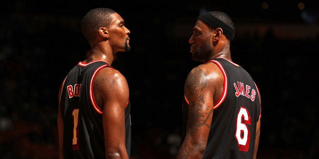 MIAMI, FL - JANUARY 23: ;(L-R) Chris Bosh #1 and LeBron James #6 of the Miami Heat during the game against the Los Angeles Lakers at American Airlines Arena in Miami, Florida on Jan. 23, 2014. NOTE TO USER: User expressly acknowledges and agrees that, by downloading and/or using this photograph, user is consenting to the terms and conditions of the Getty Images License Agreement. Mandatory copyright notice: Copyright NBAE 2014 (Photo by Issac Baldizon/NBAE via Getty Images)