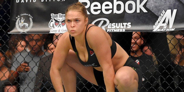 Ronda Rousey gets ready to fight Cat Zingano in a UFC 184 mixed martial arts bantamweight title bout, Saturday, Feb. 28, 2015, in Los Angeles. Rousey won after Zingano tapped out 14 seconds into the first round. (AP Photo/Mark J. Terrill)