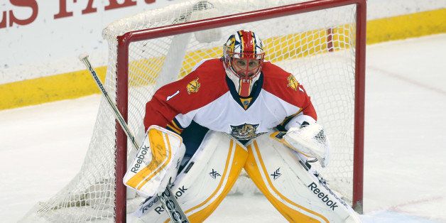 Florida Panthers goalie Roberto Luongo defends the net in the first period of an NHL hockey game against the Minnesota Wild, Thursday, Feb. 12, 2015, in St. Paul, Minn. (AP Photo/Jim Mone)