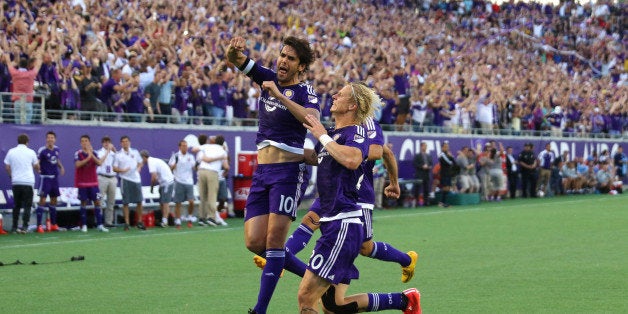 ORLANDO, FL - MARCH 08: Kaka #10 of Orlando City SC celebrates after he scores the first goal in team history during an MLS soccer match between the New York City FC and the Orlando City SC at the Orlando Citrus Bowl on March 8, 2015 in Orlando, Florida. This was the first game for both teams and the final score was 1-1.(Photo by Alex Menendez/Getty Images)