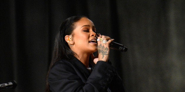 LOS ANGELES, CA - FEBRUARY 08: Rihanna performs onstage during The 57th Annual GRAMMY Awards at the STAPLES Center on Februa