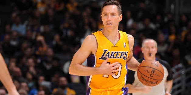 LOS ANGELES, CA - APRIL 4: Steve Nash #10 of the Los Angeles Lakers handles the ball against the Dallas Mavericks at Staples Center on April 4, 2014 in Los Angeles, California. NOTE TO USER: User expressly acknowledges and agrees that, by downloading and/or using this Photograph, user is consenting to the terms and conditions of the Getty Images License Agreement. Mandatory Copyright Notice: Copyright 2014 NBAE (Photo by Andrew D. Bernstein/NBAE via Getty Images)