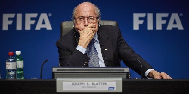 FIFA president Sepp Blatter holds a press conference at the FIFA headquarters in Zurich on March 20, 2015 at the end of a two-day meeting to decide the dates of the 2022 World Cup football tournament in Qatar. AFP PHOTO / MICHAEL BUHOLZER (Photo credit should read MICHAEL BUHOLZER/AFP/Getty Images)