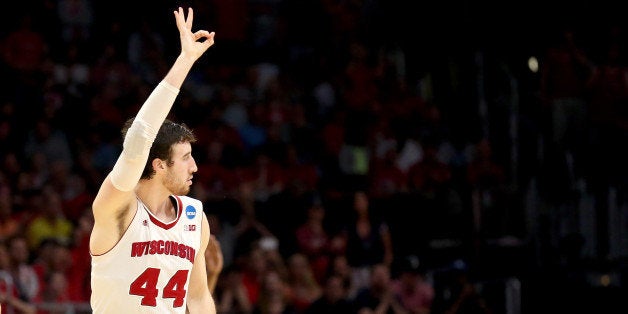 LOS ANGELES, CA - MARCH 28: Frank Kaminsky #44 of the Wisconsin Badgers reacts making a three-pointer in the second half against the Arizona Wildcats during the West Regional Final of the 2015 NCAA Men's Basketball Tournament at Staples Center on March 28, 2015 in Los Angeles, California. (Photo by Stephen Dunn/Getty Images)