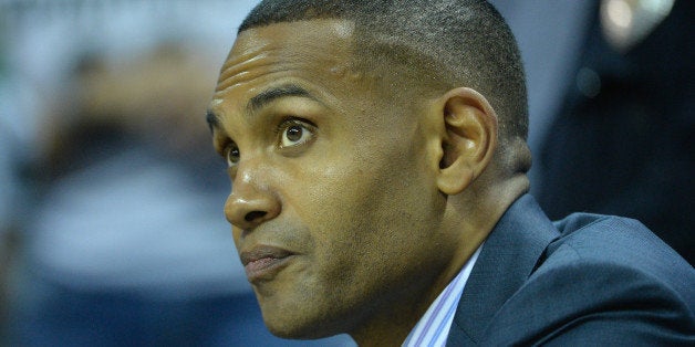 CHARLOTTE, NC - MARCH 20: College basketball analyst, Grant Hill, watches on before the game between the Georgia Bulldogs and Michigan State Spartans during the second round of the 2015 NCAA Men's Basketball Tournament at Time Warner Cable Arena on March 20, 2015 in Charlotte, North Carolina. (Photo by Grant Halverson/Getty Images)