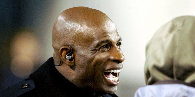 CINCINNATI, OH - NOVEMBER 6, 2014: NFL Network analyst and Pro Football Hall of Famer Deion Sanders smiles on the sideline prior to a game between the CIncinnati Bengals and Cleveland Browns on November 6, 2014 at Paul Brown Stadium in Cincinnati, Ohio. Cleveland won 24-3. (Photo by Nick Cammett/Diamond Images/Getty Images)