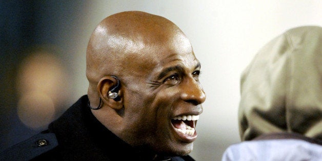 CINCINNATI, OH - NOVEMBER 6, 2014: NFL Network analyst and Pro Football Hall of Famer Deion Sanders smiles on the sideline prior to a game between the CIncinnati Bengals and Cleveland Browns on November 6, 2014 at Paul Brown Stadium in Cincinnati, Ohio. Cleveland won 24-3. (Photo by Nick Cammett/Diamond Images/Getty Images) 