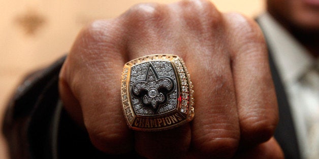 NEW ORLEANS - JUNE 16: A member of the New Orleans Saints shows off his ring from Super Bowl XLIV on June 16, 2010 in New Or