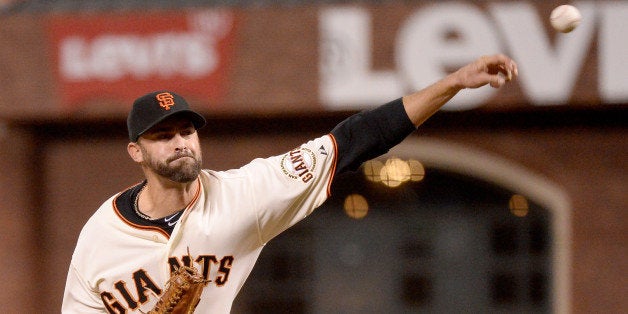SAN FRANCISCO, CA - OCTOBER 15: Jeremy Affeldt #41 of the San Francisco Giants pitches in the seventh inning against the St.