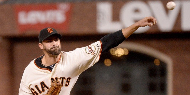 SAN FRANCISCO, CA - OCTOBER 15: Jeremy Affeldt #41 of the San Francisco Giants pitches in the seventh inning against the St. Louis Cardinals during Game Four of the National League Championship Series at AT&T Park on October 15, 2014 in San Francisco, California. (Photo by Harry How/Getty Images)