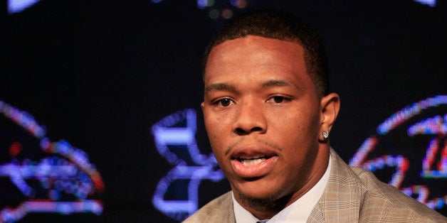 OWINGS MILLS, MD - MAY 23: Running back Ray Rice of the Baltimore Ravens addresses a news conference with his wife Janay (no