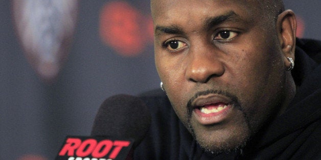 Former Oregon State and NBA basketball player Gary Payton talks before their NCAA college basketball game against Southern Ca