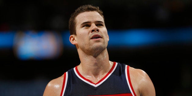 Washington Wizards forward Kris Humphries sets for free throw attempt against the Denver Nuggets in the fourth quarter of an NBA basketball game Sunday, Jan. 25, 2015, in Denver. The Wizards won 117-115 in overtime. (AP Photo/David Zalubowski)