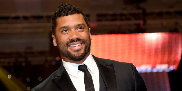 PHOENIX, AZ - MARCH 28: Seattle Seahawks quarterback Russell Wilson onstage during Muhammad Ali's Celebrity Fight Night XXI at the Jw Marriott Phoenix Desert Ridge Resort & Spa on March 28, 2015 in Phoenix, Arizona. (Photo by Ethan Miller/Getty Images for Celebrity Fight Night)