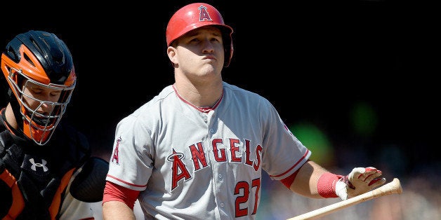 SAN FRANCISCO, CA - MAY 03: Mike Trout #27 of the Los Angeles Angels of Anaheim reacts and walks back to the dugout after he