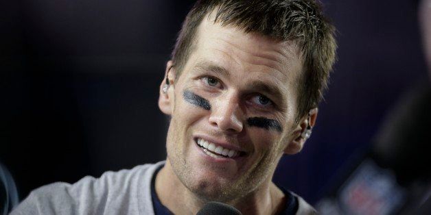 New England Patriots quarterback Tom Brady (12) responds to questions during a news interview after the NFL Super Bowl XLIX football game against the Seattle Seahawks Sunday, Feb. 1, 2015, in Glendale, Ariz. The Patriots won the game 28-24. (AP Photo/Mark Humphrey)