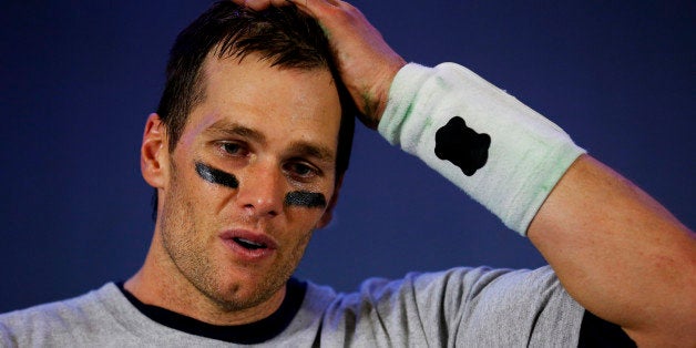 GLENDALE, AZ - FEBRUARY 01: Tom Brady #12 of the New England Patriots talks to the media after winning Super Bowl XLIX 28-24 against the Seattle Seahawks at University of Phoenix Stadium on February 1, 2015 in Glendale, Arizona. (Photo by Tom Pennington/Getty Images)