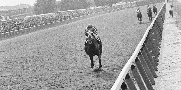 Secretariat, with jockey Ron Turcotte up, leads the field of Belmont Stakes at Belmont Park, Elmont, New York, June 9, 1973 t