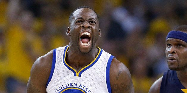 Golden State Warriors forward Draymond Green (23) celebrates after making a three point basket in front of Memphis Grizzlies forward Zach Randolph (50) during the first half of Game 1 in a second-round NBA playoff basketball series in Oakland, Calif., Sunday, May 3, 2015. (AP Photo/Marcio Jose Sanchez)
