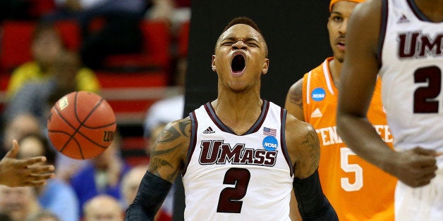 RALEIGH, NC - MARCH 21: Derrick Gordon #2 of the Massachusetts Minutemen reacts while taking on the Tennessee Volunteers in the second round of the 2014 NCAA Men's Basketball Tournament at PNC Arena on March 21, 2014 in Raleigh, North Carolina. (Photo by Streeter Lecka/Getty Images)