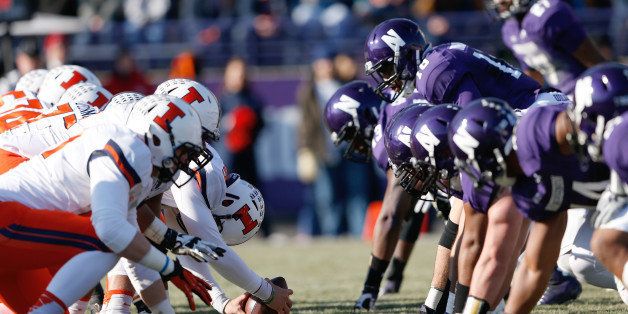 Illinois and Northwestern players line up at the line of scrimmage prior to the snap of the football during a NCAA Football game between the Illinois Fighting Illini and the Northwestern Wildcats in Evanston, Illinois on Saturday, November 29, 2014. Illinois defeated Northwestern 47-33. (AP Photo/Scott Boehm)