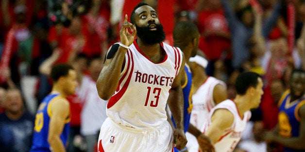 HOUSTON, TX - MAY 25: James Harden #13 of the Houston Rockets reacts in the third quarter against the Golden State Warriors during Game Four of the Western Conference Finals of the 2015 NBA Playoffs at Toyota Center on May 25, 2015 in Houston, Texas. NOTE TO USER: User expressly acknowledges and agrees that, by downloading and or using this photograph, user is consenting to the terms and conditions of Getty Images License Agreement. (Photo by Ronald Martinez/Getty Images)