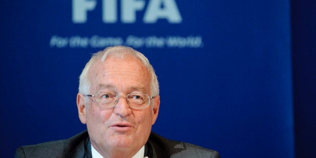 Hans-Joachim Eckert, Chairman of the adjudicatory chamber of the FIFA Ethics Committee, answers to journalists during a press conference at the FIFA's headquarter on July 27, 2012, in Zurich. AFP PHOTO / SEBASTIEN BOZON (Photo credit should read SEBASTIEN BOZON/AFP/GettyImages)