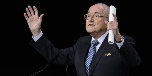 FIFA president Sepp Blatter gestures as he delivers his speech ahead of the vote to decide on the FIFA presidency in Zurich on May 29, 2015. Blatter vowed in his speech to lead FIFA 'out of the storm' if re-elected president. AFP PHOTO / FABRICE COFFRINI (Photo credit should read FABRICE COFFRINI/AFP/Getty Images)