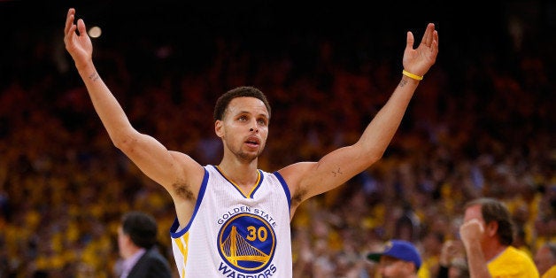 OAKLAND, CA - MAY 27: Stephen Curry #30 of the Golden State Warriors celebrates late in the fourth quarter against the Houst
