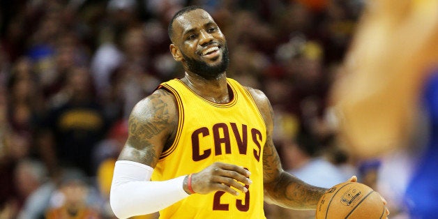 CLEVELAND, OH - JUNE 09: LeBron James #23 of the Cleveland Cavaliers smiles in the third quarter against the Golden State Warriors during Game Three of the 2015 NBA Finals at Quicken Loans Arena on June 9, 2015 in Cleveland, Ohio. NOTE TO USER: User expressly acknowledges and agrees that, by downloading and or using this photograph, user is consenting to the terms and conditions of Getty Images License Agreement. (Photo by Mike Ehrmann/Getty Images)