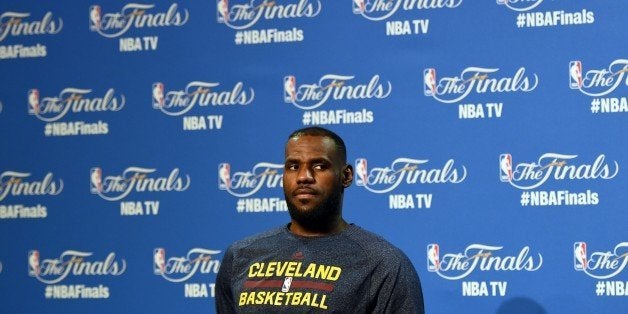 LeBron James of the Cleveland Cavaliers holds a press conference June 10, 2015 at the at Quicken Loans Arena in Cleveland, Ohio. Another spectacular all-around performance by LeBron James and Matthew Dellavedova's gritty effort sparked the Cleveland Cavaliers over Golden State 96-91 Tuesday in game three of the NBA Finals. The Cavaliers seized a 2-1 lead in the best-of-seven series with game four Thursday in Cleveland. Teams winning game three after a split have taken the final 84 percent of the time. AFP PHOTO / TIMOTHY A. CLARY (Photo credit should read TIMOTHY A. CLARY/AFP/Getty Images)