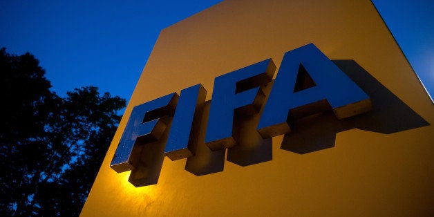 ZURICH, SWITZERLAND - JUNE 02: A FIFA logo sits on a sign at the FIFA headquarters on June 2, 2015 in Zurich, Switzerland. Jo