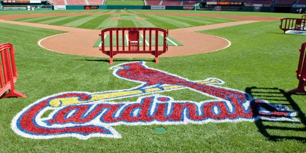 A freshly painted St. Louis Cardinals logo adorns the grass behind home plate Friday, Oct. 6, 2006 at Busch Stadium in St. L