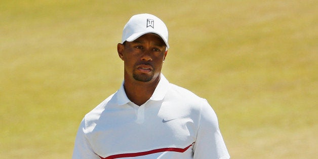 UNIVERSITY PLACE, WA - JUNE 19: Tiger Woods of the United States reacts on the ninth green during the second round of the 115