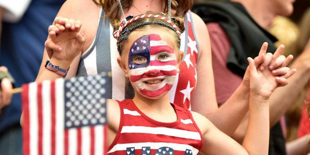 VANCOUVER, BC - JUNE 16: A fan of the United States team cheers on their team before taking on Nigeria in their Group D match of the FIFA Women's World Cup Canada 2015 at BC Place Stadium on June 16, 2015 in Vancouver, Canada. (Photo by Rich Lam/Getty Images)